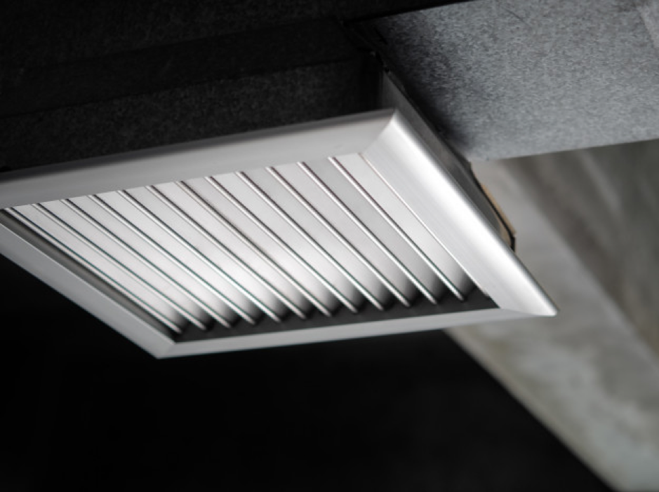 Air ventilating tube installed on the ceiling of the office building. Premium Photo